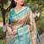 Sky blue woven self design embellished pure silk saree with blouse