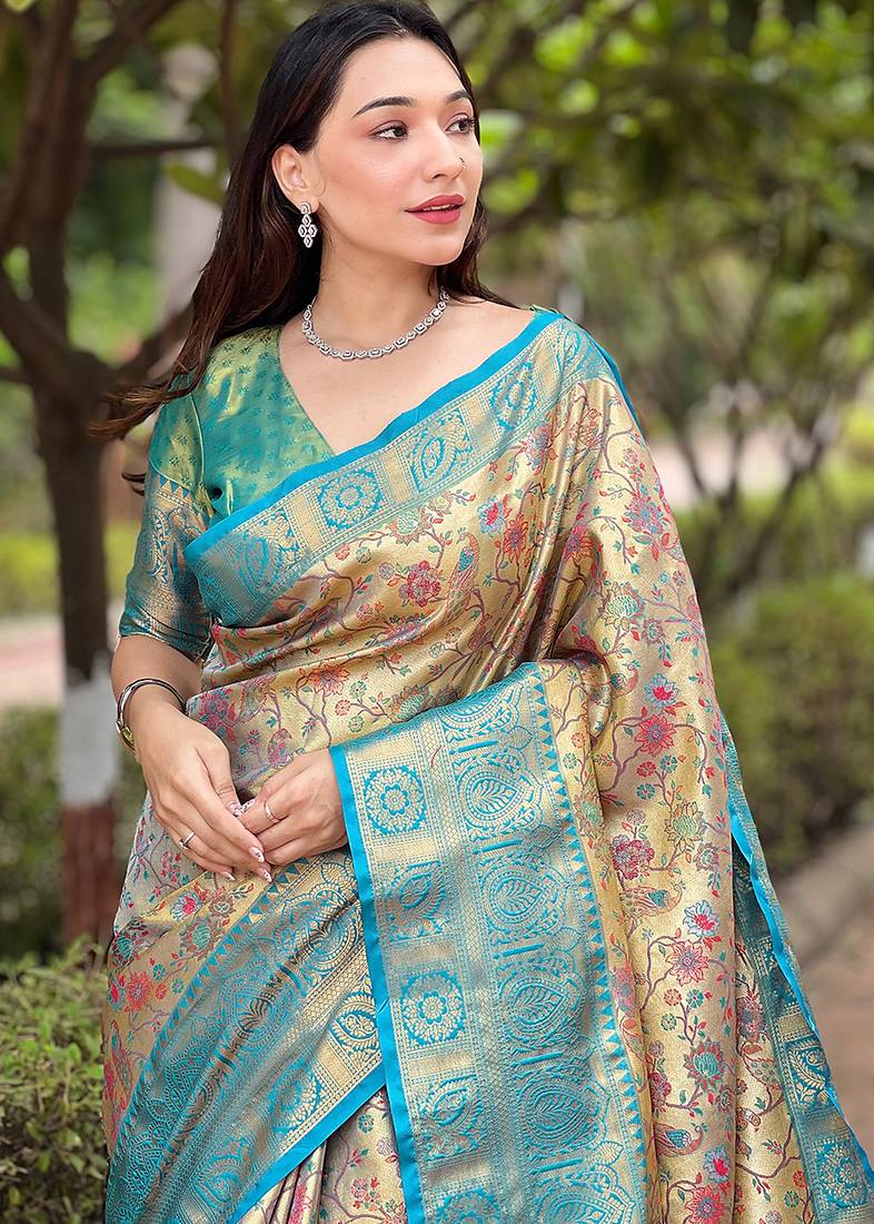 Sky blue woven self design embellished pure silk saree with blouse