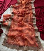 Rust Color embroidery work chiffon saree 
