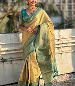 Beige woven self design embellished tissue kanjivaram saree with blouse