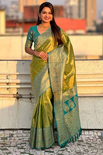 Green woven self design embellished tissue kanjivaram saree with blouse