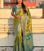 Green woven self design embellished tissue kanjivaram saree with blouse