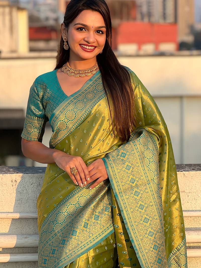 Green woven self design embellished tissue kanjivaram saree with blouse