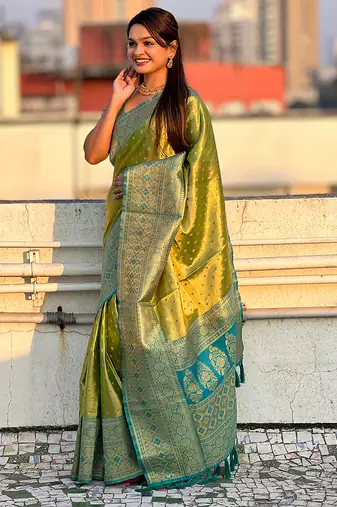 Green woven self design embellished tissue kanjivaram saree with blouse