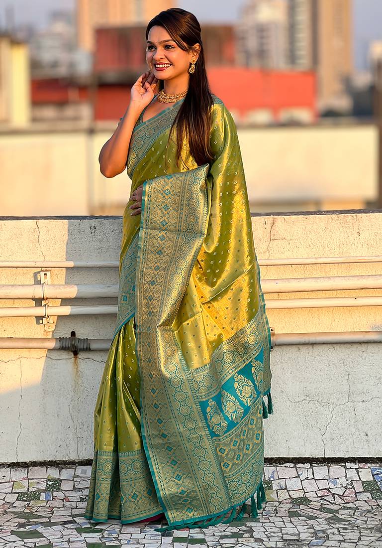 Green woven self design embellished tissue kanjivaram saree with blouse