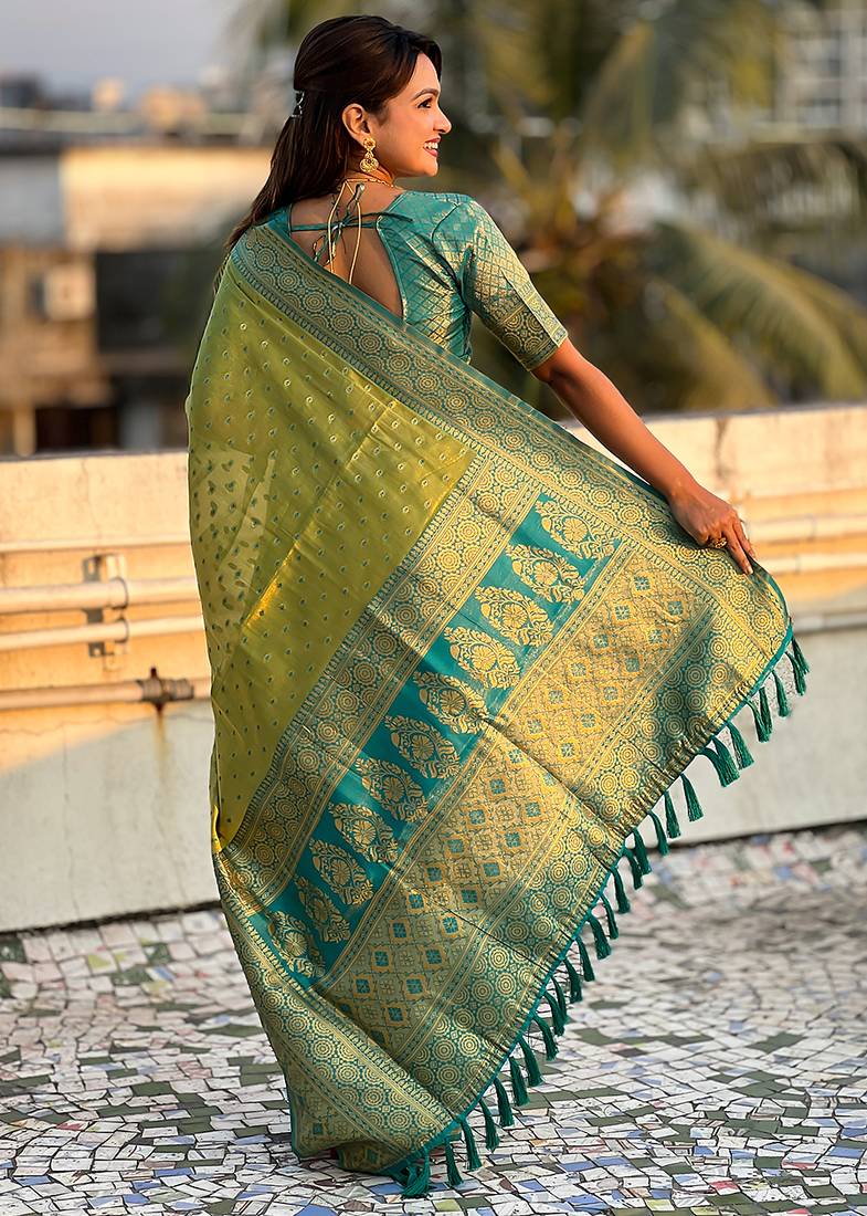 Green woven self design embellished tissue kanjivaram saree with blouse