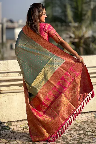 Grey woven self design embellished tissue kanjivaram saree with blouse