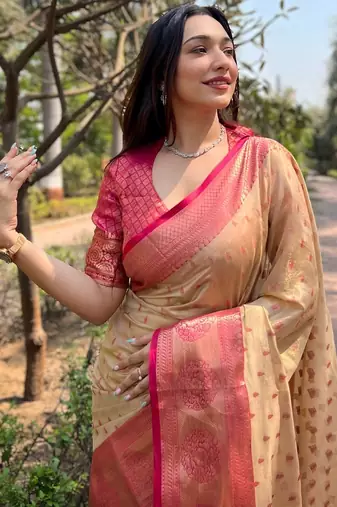 Beige woven self design embellished tissue kanjivaram saree with blouse