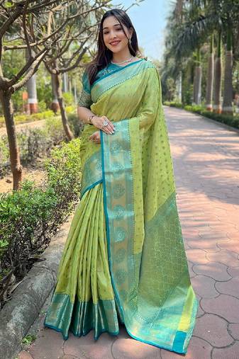 Green woven self design embellished tissue kanjivaram saree with blouse