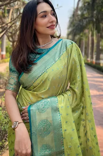 Green woven self design embellished tissue kanjivaram saree with blouse