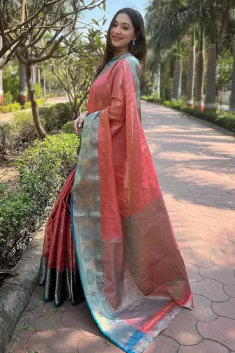 Peach woven self design embellished tissue kanjivaram saree with blouse