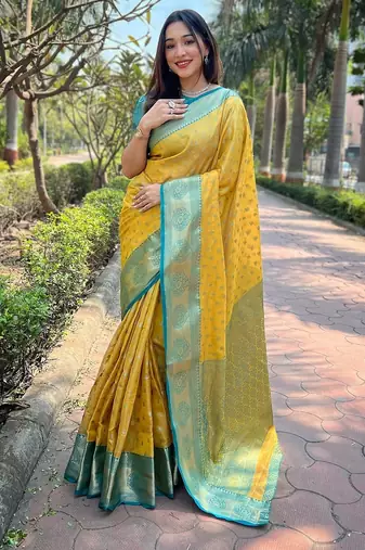 Yellow woven self design embellished tissue kanjivaram saree with blouse
