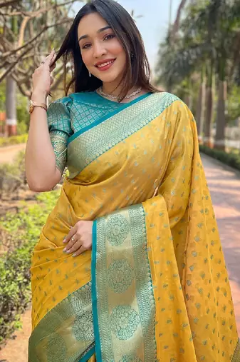 Yellow woven self design embellished tissue kanjivaram saree with blouse