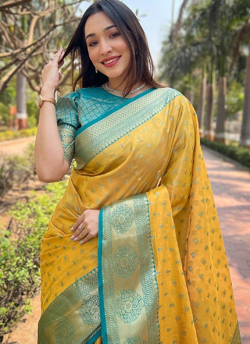 Yellow woven self design embellished tissue kanjivaram saree with blouse
