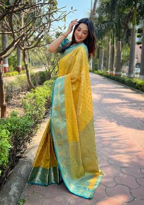 Yellow woven self design embellished tissue kanjivaram saree with blouse 3