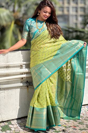 Green woven self design embellished tissue kanjivaram saree with blouse