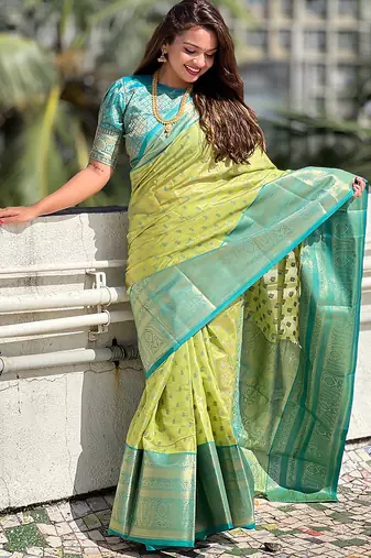 Green woven self design embellished tissue kanjivaram saree with blouse