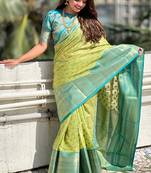 Green woven self design embellished tissue kanjivaram saree with blouse