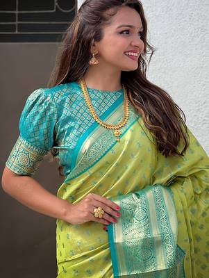 Green woven self design embellished tissue kanjivaram saree with blouse 2