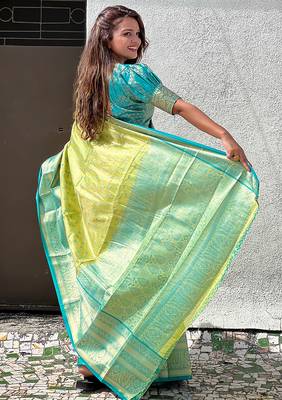 Green woven self design embellished tissue kanjivaram saree with blouse 3