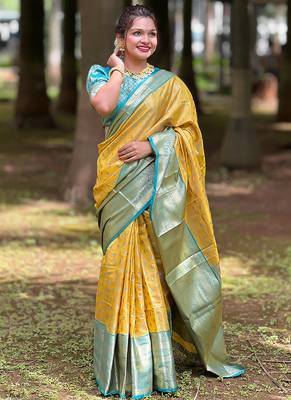 Yellow woven self design embellished tissue kanjivaram saree with blouse 1