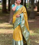 Yellow woven self design embellished tissue kanjivaram saree with blouse