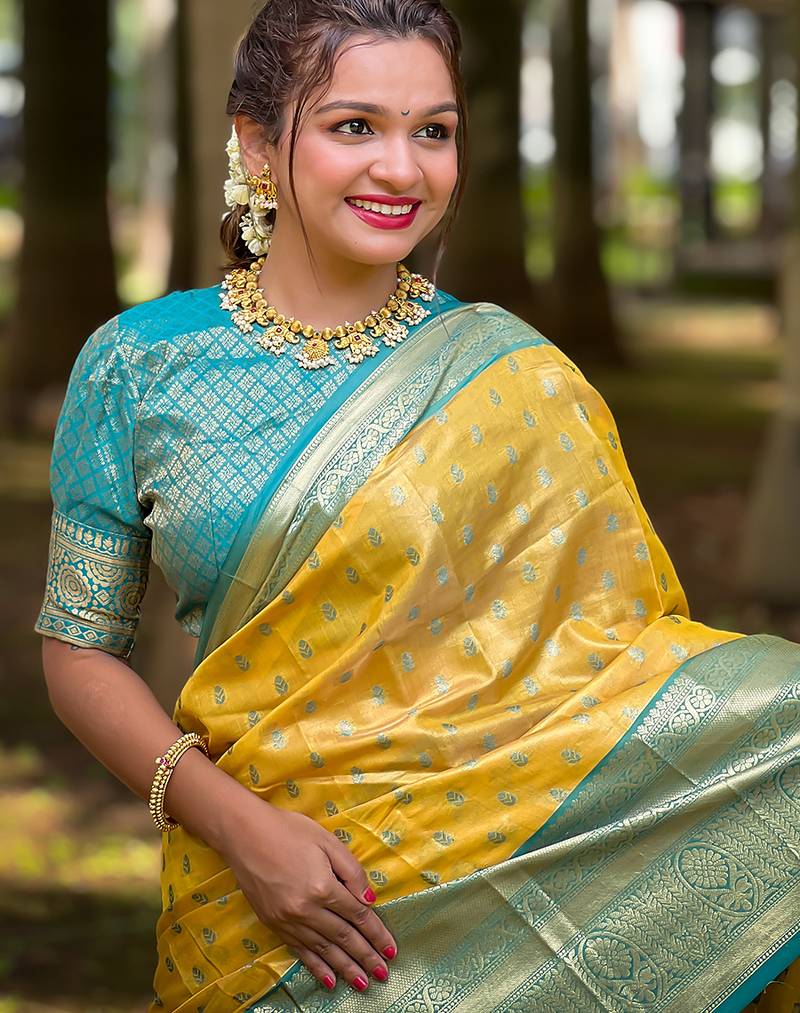 Yellow woven self design embellished tissue kanjivaram saree with blouse