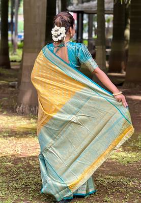 Yellow woven self design embellished tissue kanjivaram saree with blouse 4