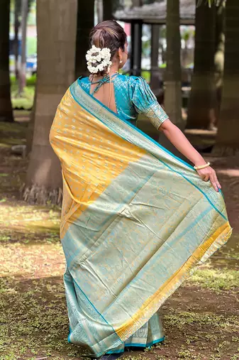 Yellow woven self design embellished tissue kanjivaram saree with blouse