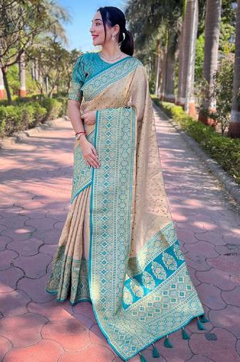 Beige woven self design embellished tissue kanjivaram saree with blouse