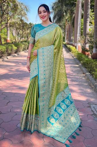Green woven self design embellished tissue kanjivaram saree with blouse