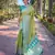 Green woven self design embellished tissue kanjivaram saree with blouse
