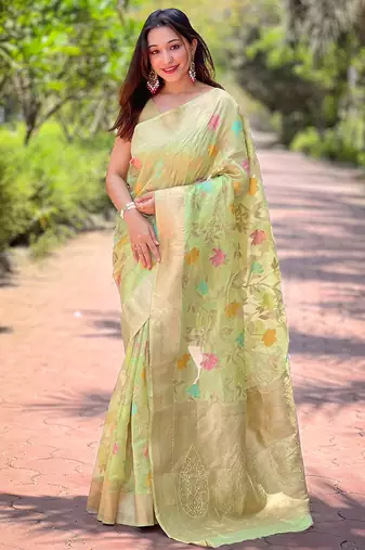 Pista green woven embellished organza kanjivaram saree with blouse