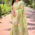 Pista green woven embellished organza kanjivaram saree with blouse