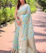 Sky blue woven embellished organza kanjivaram saree with blouse