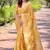 Yellow woven embellished organza kanjivaram saree with blouse