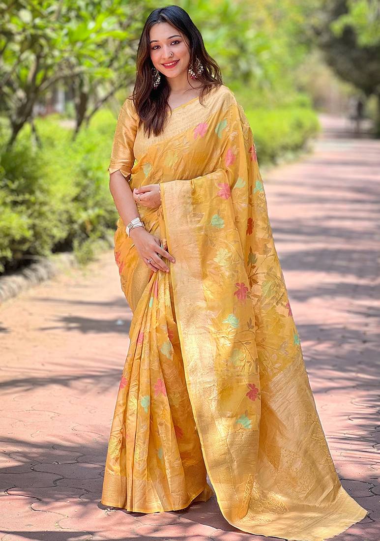 Yellow woven embellished organza kanjivaram saree with blouse