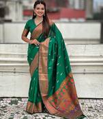 Green woven self design pure silk paithani saree with blouse