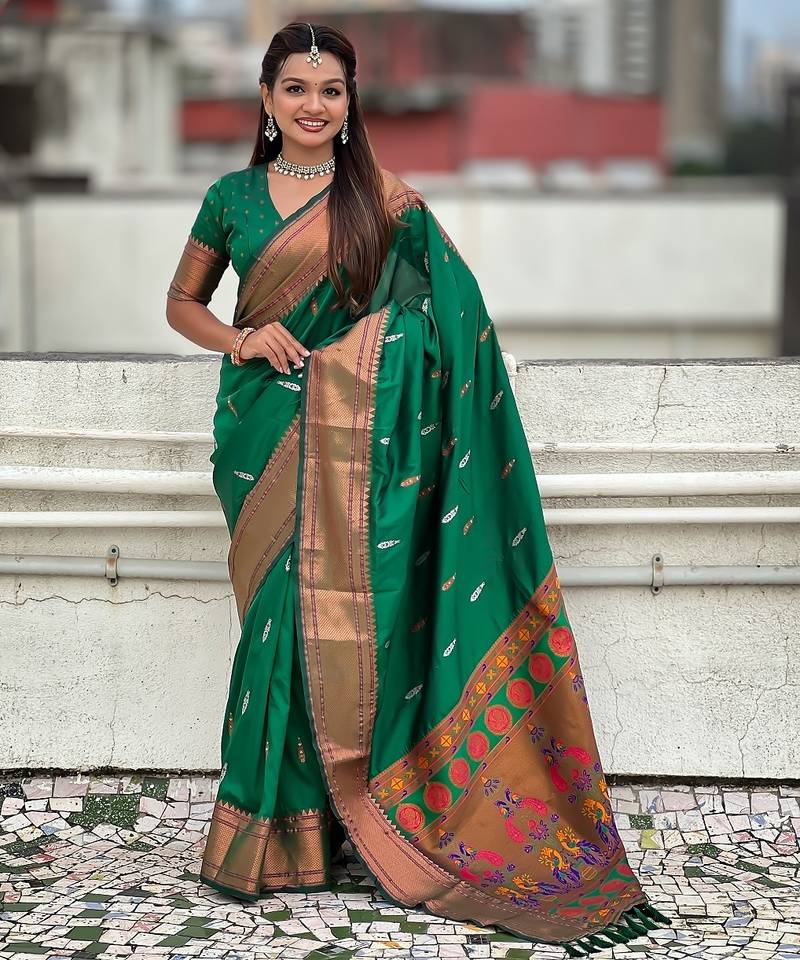 Green woven self design pure silk paithani saree with blouse