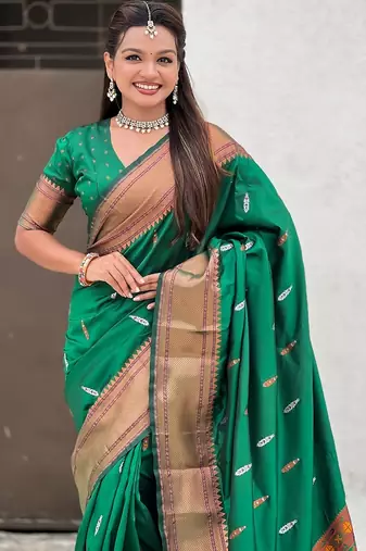 Green woven self design pure silk paithani saree with blouse