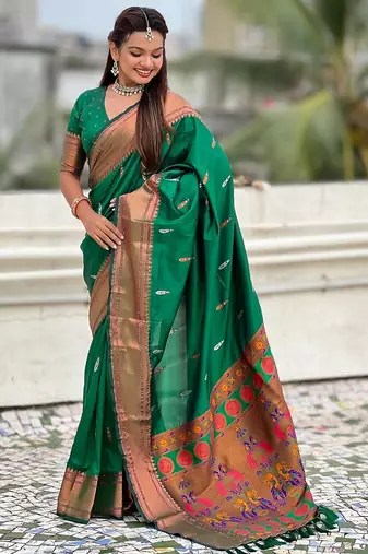 Green woven self design pure silk paithani saree with blouse