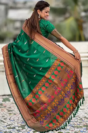 Green woven self design pure silk paithani saree with blouse