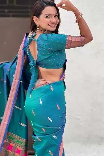 Teal blue woven self design pure silk paithani saree with blouse