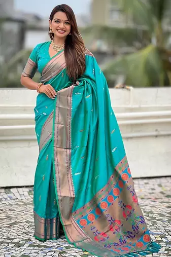Teal green woven self design pure silk paithani saree with blouse
