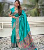 Teal green woven self design pure silk paithani saree with blouse