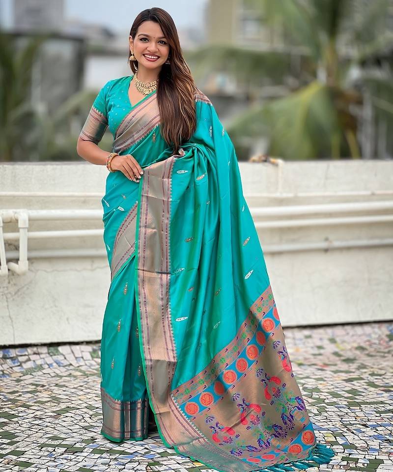 Teal green woven self design pure silk paithani saree with blouse