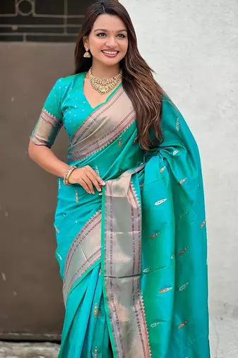 Teal green woven self design pure silk paithani saree with blouse