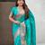 Teal green woven self design pure silk paithani saree with blouse