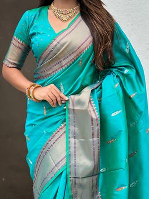 Teal green woven self design pure silk paithani saree with blouse 4