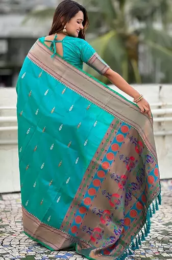 Teal green woven self design pure silk paithani saree with blouse